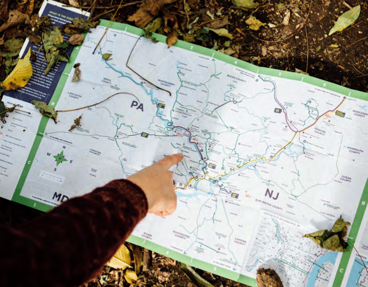user pointing at Circuit Trails map